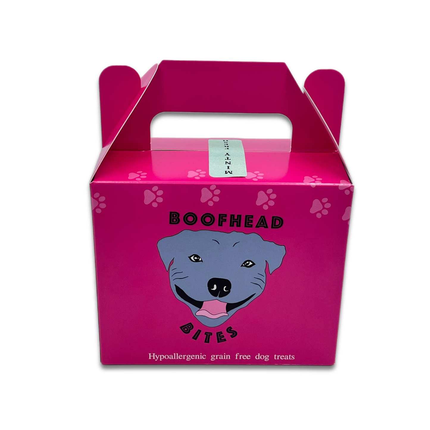 A pink box featuring a playful dog face design, adding a whimsical touch to any setting.