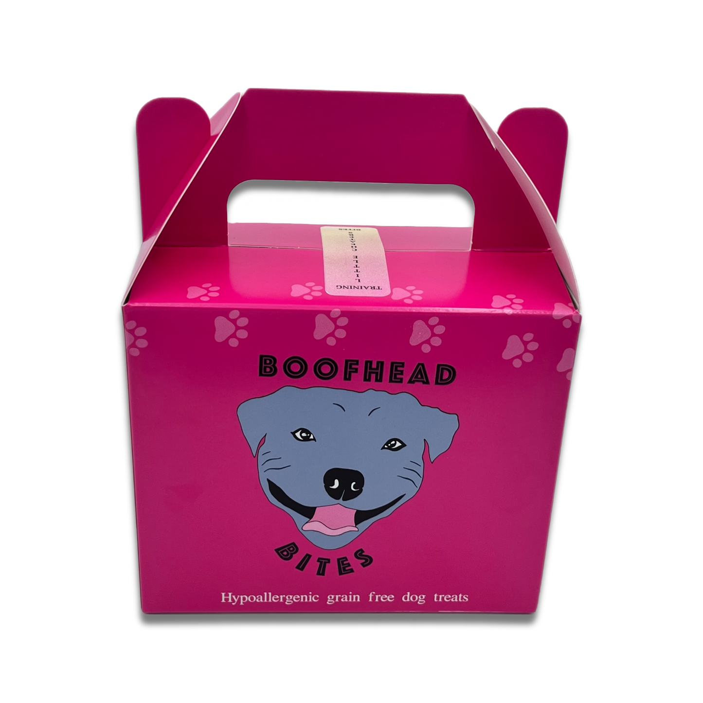A pink box featuring a playful dog face design, adding a whimsical touch to any setting.