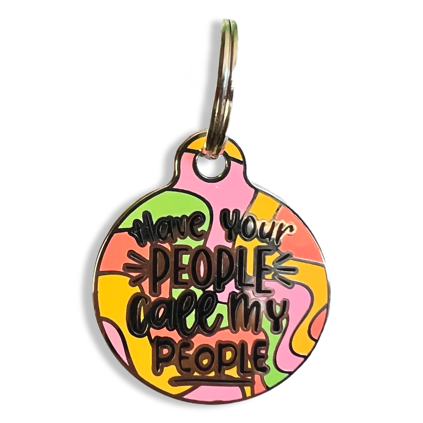 A pet ID tag inscribed with "Have your people call my people," ensuring quick communication for lost pets.