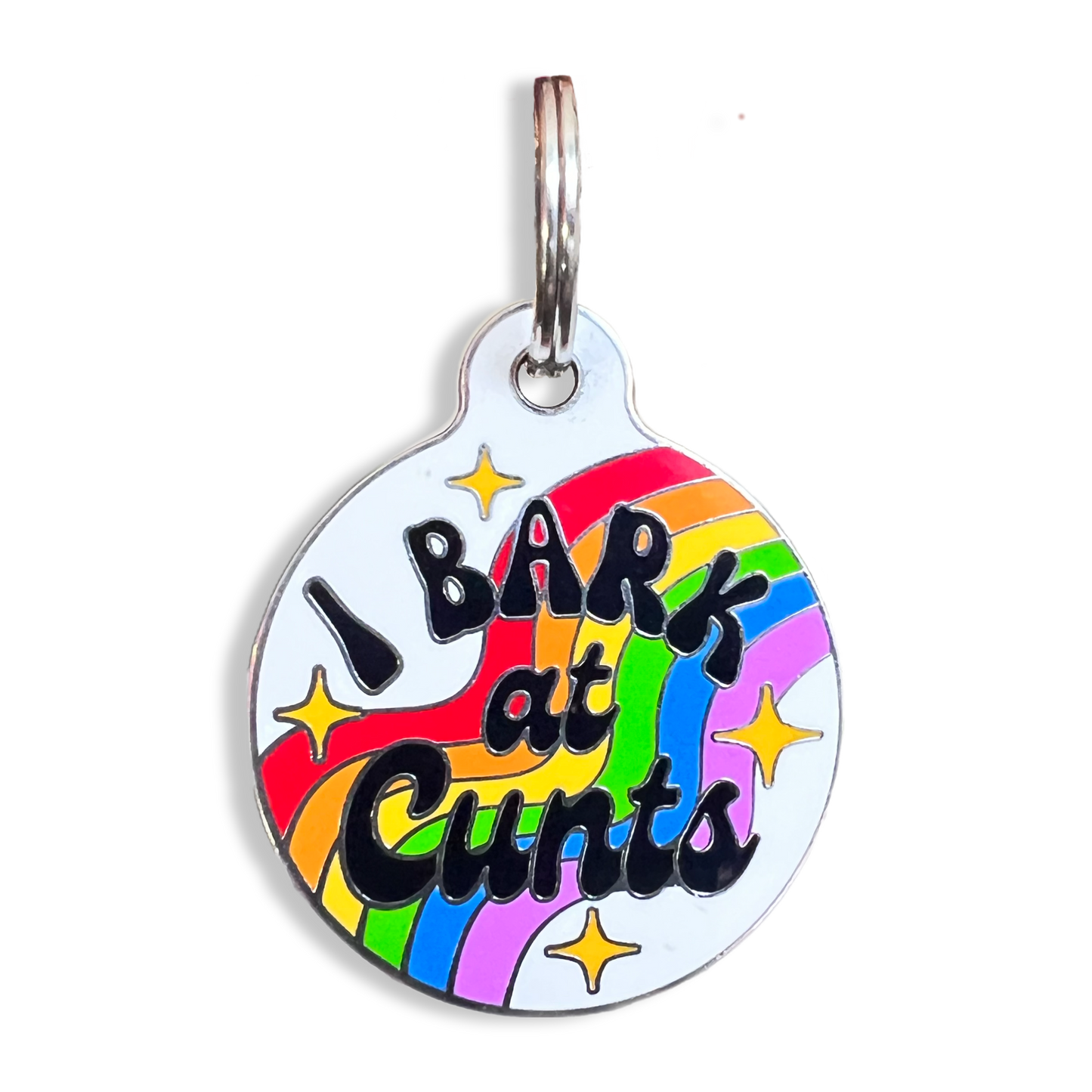 A humorous dog tag featuring the phrase "I bark at cunts," showcasing a playful attitude towards canine behavior.