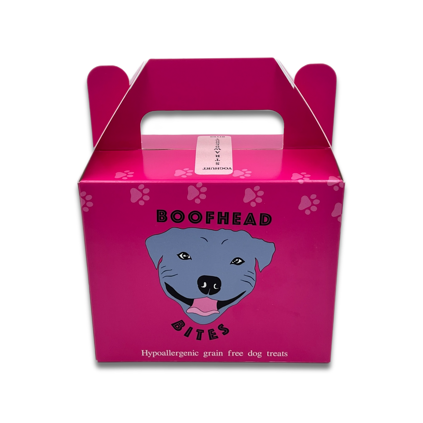 A pink box featuring a playful dog face design that resembles a Staffordshire bull terrier, adding a whimsical touch to any setting