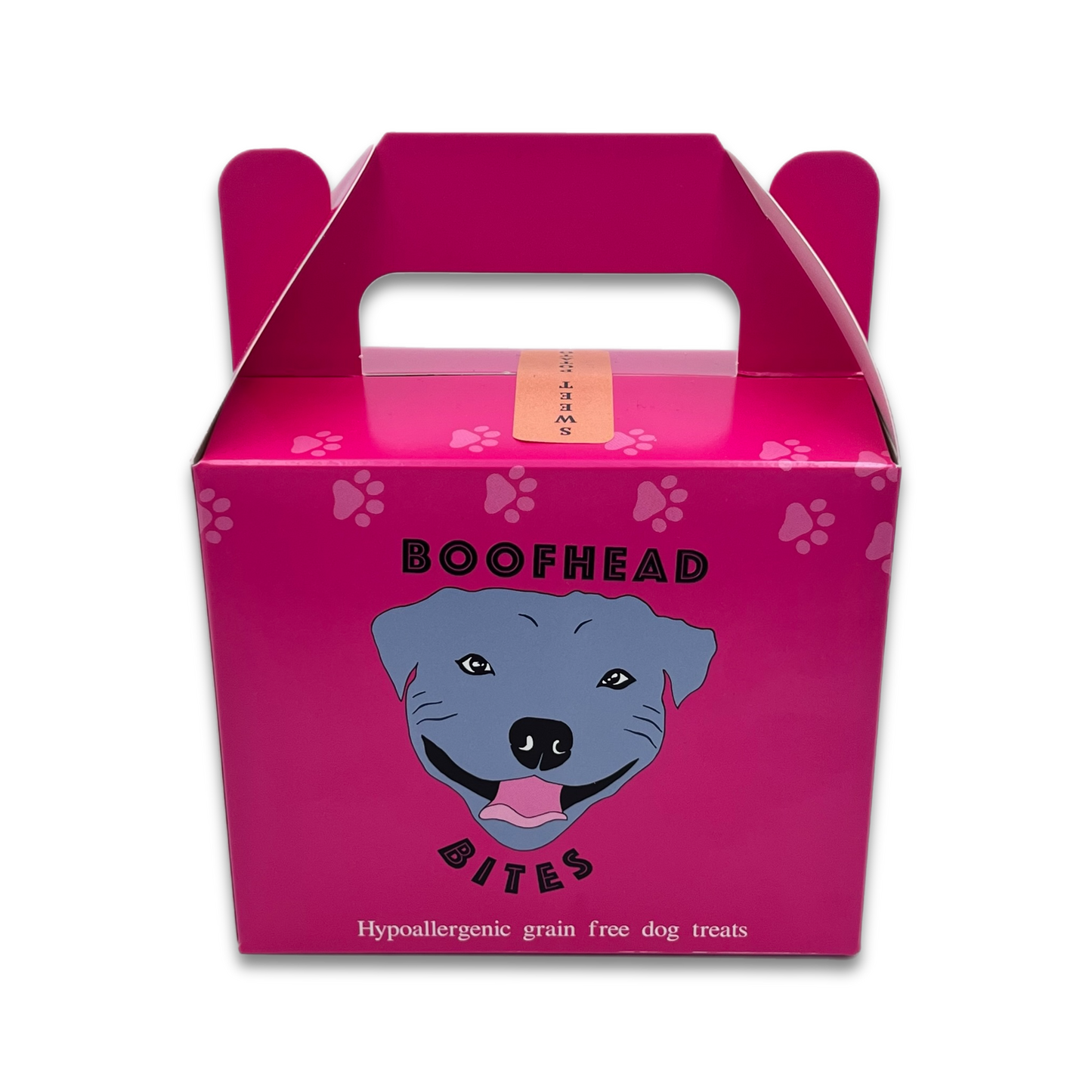 A pink box featuring a playful dog face design, adding a whimsical touch to any setting.